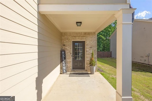 104 Auburn Xing, Auburn, GA 30011 - doorway to property featuring a lawn