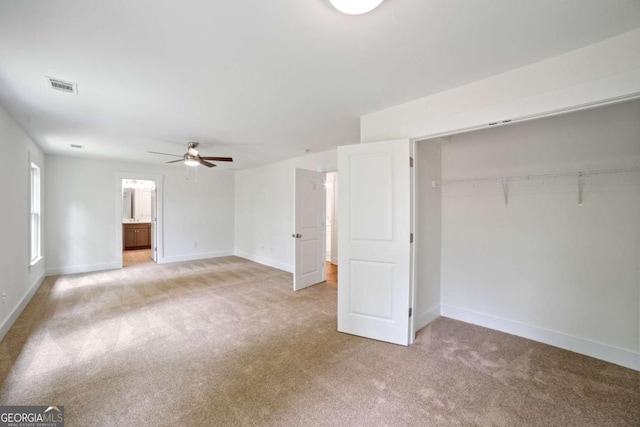 2714 Eagles Crest Ln, Decatur, GA 30034 - unfurnished living room featuring light colored carpet, a ceiling fan, and baseboards