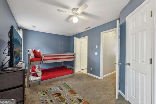 7077 Biltmore Trce, Lithonia, GA 30058 - bedroom with carpet floors and a ceiling fan