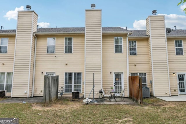 7077 Biltmore Trce, Lithonia, GA 30058 - rear view of property featuring a patio area, a chimney, and a lawn