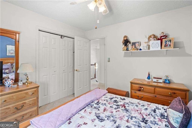 3472 Honeycomb Dr SE, Conyers, GA 30094 - bedroom featuring a closet and ceiling fan