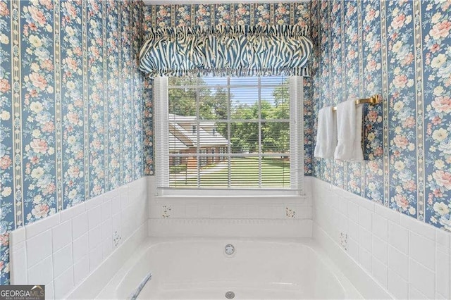 3472 Honeycomb Dr SE, Conyers, GA 30094 - full bathroom with wallpapered walls and a garden tub