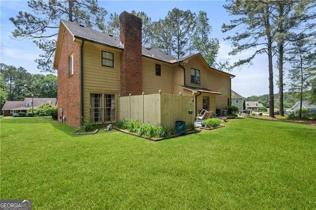 3472 Honeycomb Dr SE, Conyers, GA 30094 - back of house with a chimney