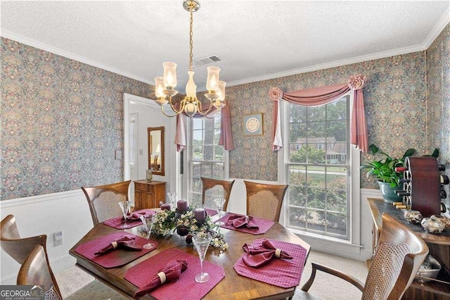 3472 Honeycomb Dr SE, Conyers, GA 30094 - dining area with wallpapered walls, a chandelier, a textured ceiling, a wainscoted wall, and crown molding