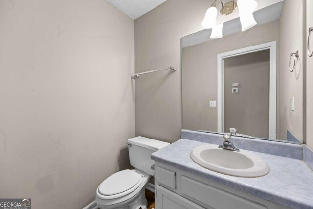 470 Piney Way SW, Atlanta, GA 30331 - half bath featuring toilet and vanity