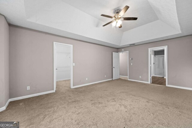470 Piney Way SW, Atlanta, GA 30331 - unfurnished bedroom with a raised ceiling, carpet flooring, and baseboards