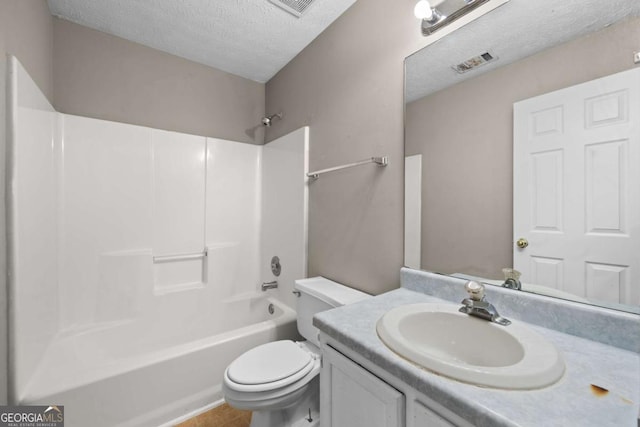 470 Piney Way SW, Atlanta, GA 30331 - bathroom with a textured ceiling, toilet, vanity, and shower / washtub combination