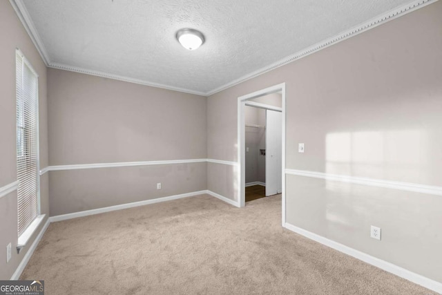 470 Piney Way SW, Atlanta, GA 30331 - carpeted spare room featuring ornamental molding, a textured ceiling, and baseboards