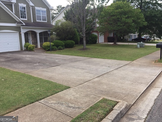 3639 Cape Ln, Conyers, GA 30013 - view of side of home with driveway, a porch, and a yard