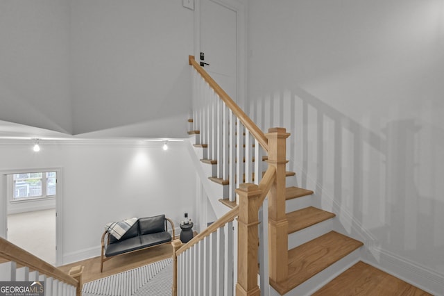 4015 Wieuca Rd NE, Atlanta, GA 30342 - stairway with wood finished floors and baseboards