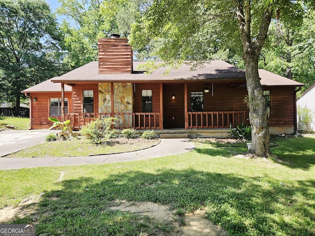 6698 Cameron Rd, Morrow, GA 30260 - view of front of property featuring covered porch, a chimney, and a front lawn