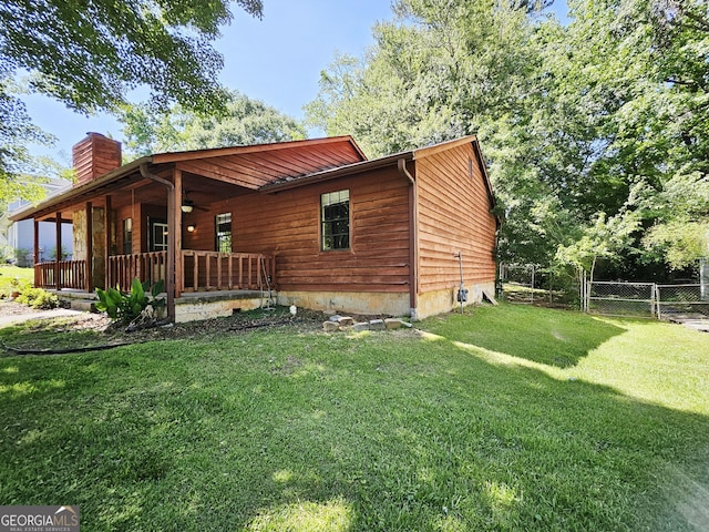 6698 Cameron Rd, Morrow, GA 30260 - view of front of property featuring a chimney and a ceiling fan