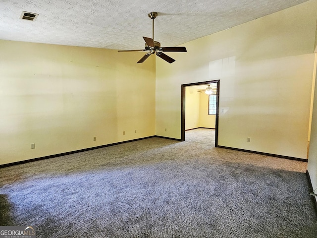 6698 Cameron Rd, Morrow, GA 30260 - spare room featuring a ceiling fan, carpet floors, baseboards, and a textured ceiling