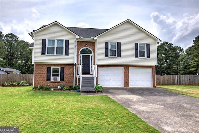 14 Cathedral Hts, Euharlee, GA 30120 - bi-level home featuring brick siding, an attached garage, and driveway