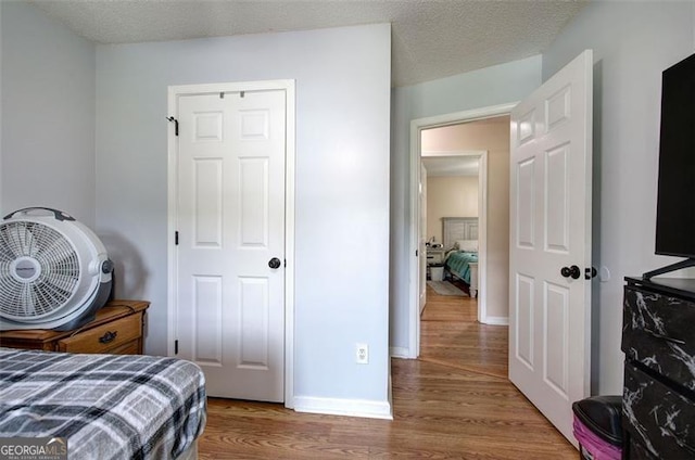 14 Cathedral Hts, Euharlee, GA 30120 - bedroom featuring wood finished floors and baseboards