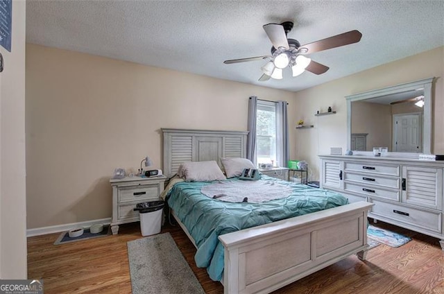 14 Cathedral Hts, Euharlee, GA 30120 - bedroom with wood finished floors, a textured ceiling, ceiling fan, and baseboards