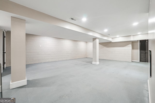 2771 Smithsonia Way, Tucker, GA 30084 - finished basement featuring concrete block wall and recessed lighting