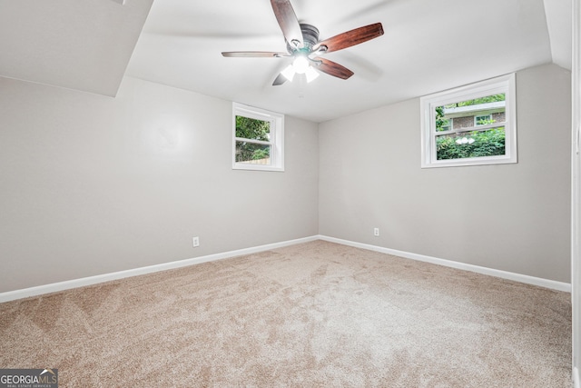 2771 Smithsonia Way, Tucker, GA 30084 - carpeted empty room featuring ceiling fan, baseboards, and lofted ceiling