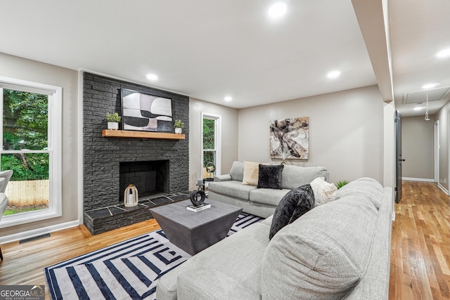 2771 Smithsonia Way, Tucker, GA 30084 - living area featuring attic access, wood finished floors, recessed lighting, and baseboards