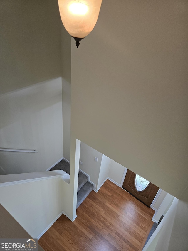 4677 Liberty Square Dr, Acworth, GA 30101 - staircase with wood finished floors and baseboards