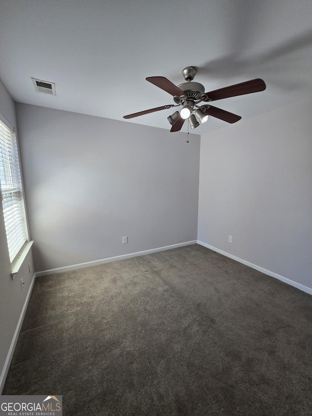 4677 Liberty Square Dr, Acworth, GA 30101 - unfurnished room featuring a ceiling fan and dark colored carpet