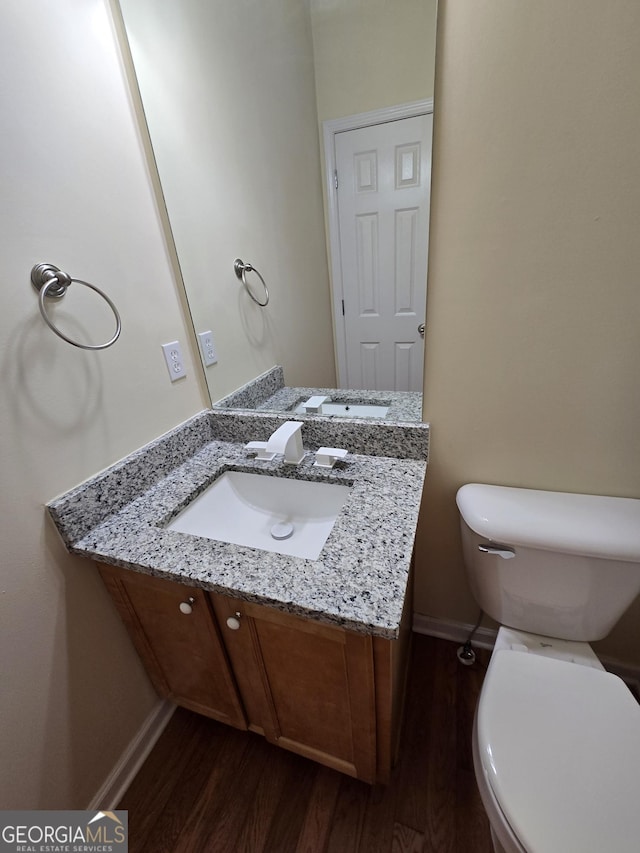 4677 Liberty Square Dr, Acworth, GA 30101 - half bath featuring wood finished floors and vanity
