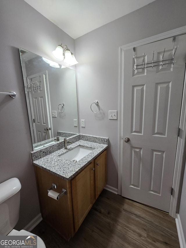 4677 Liberty Square Dr, Acworth, GA 30101 - half bath featuring vanity and wood finished floors