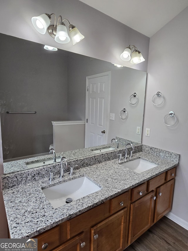 4677 Liberty Square Dr, Acworth, GA 30101 - full bathroom featuring double vanity and wood finished floors