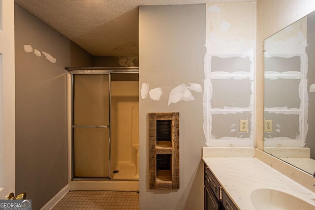357 Camp Wahsega Rd, Dahlonega, GA 30533 - full bathroom featuring a stall shower, vanity, and a textured ceiling