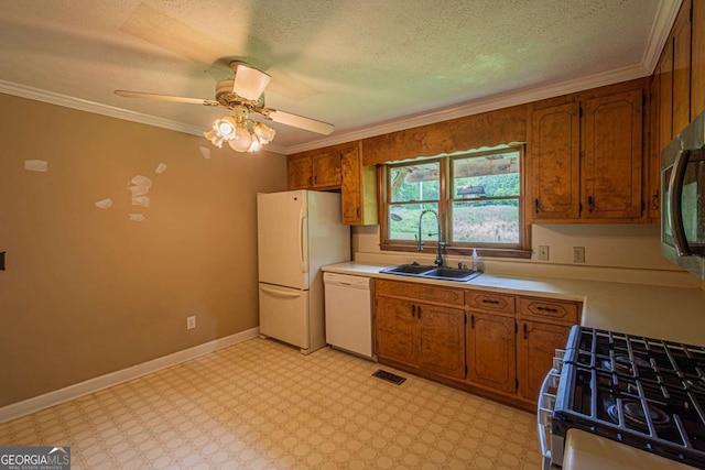 357 Camp Wahsega Rd, Dahlonega, GA 30533 - kitchen featuring stainless steel appliances, brown cabinets, light countertops, ornamental molding, and a textured ceiling
