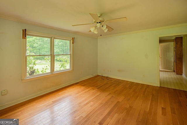 357 Camp Wahsega Rd, Dahlonega, GA 30533 - empty room with wood-type flooring, ornamental molding, and a ceiling fan