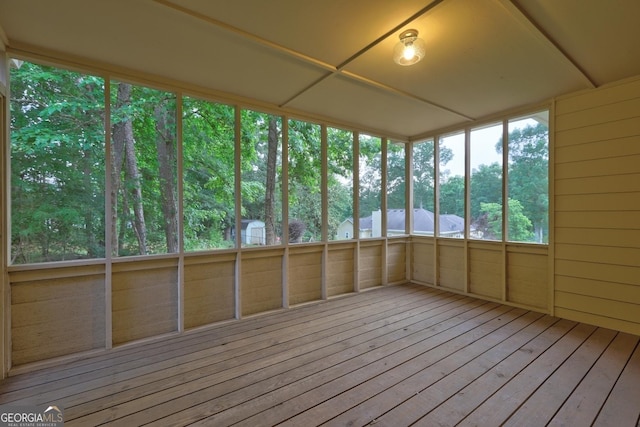 221 Ashley Oaks Dr, Mcdonough, GA 30253 - unfurnished sunroom with wood-type flooring and wood walls