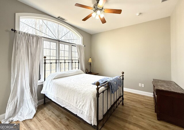 297 Old Clarkesville Mill Rd, Clarkesville, GA 30523 - bedroom featuring wood finished floors, baseboards, and a ceiling fan