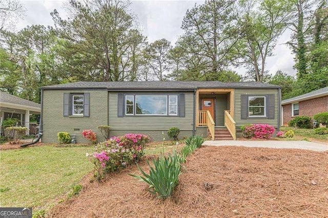 525 Rosemont Dr, Decatur, GA 30032 - view of front of house with crawl space and a front yard