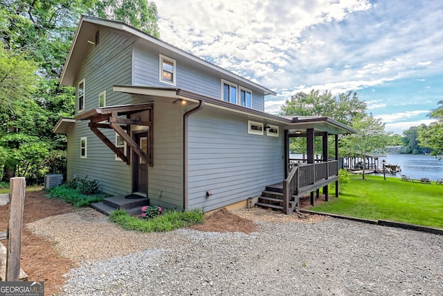 4610 Murray Cove Rd, Tiger, GA 30576 - view of property exterior featuring a lawn, cooling unit, and a water view