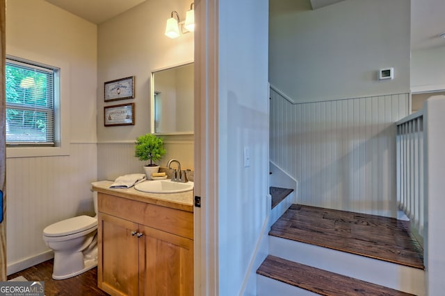 4610 Murray Cove Rd, Tiger, GA 30576 - stairway with wainscoting and wood finished floors
