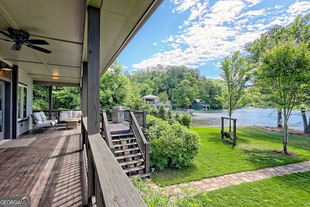 4610 Murray Cove Rd, Tiger, GA 30576 - deck featuring a water view, a lawn, ceiling fan, outdoor lounge area, and stairs
