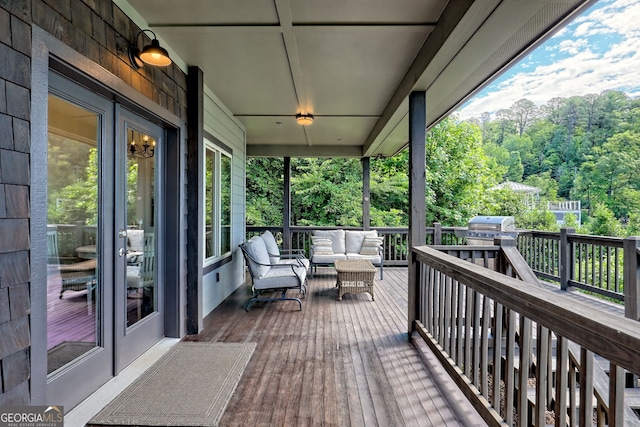 4610 Murray Cove Rd, Tiger, GA 30576 - wooden deck featuring an outdoor living space, area for grilling, and a forest view