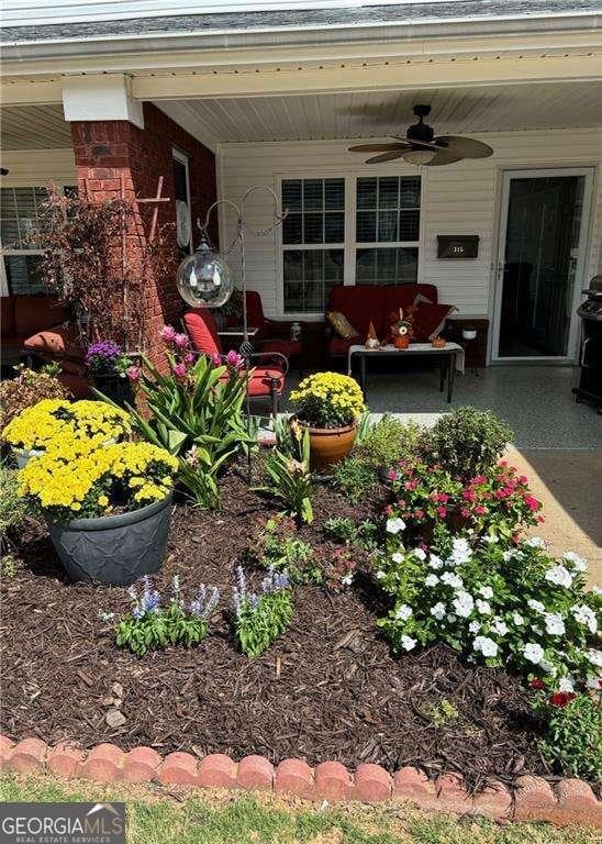 150 Old Mill Rd Unit 315, Cartersville, GA 30120 - doorway to property featuring a ceiling fan, an outdoor living space, and a patio area