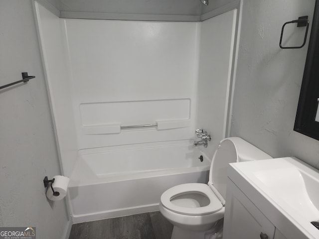 2615 Old S Ct, Jonesboro, GA 30236 - full bathroom featuring toilet, shower / washtub combination, wood finished floors, and vanity
