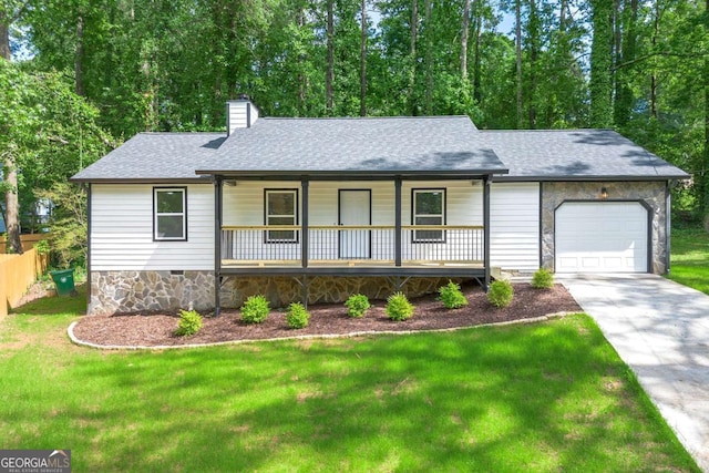 4043 Chedworth Way, Stone Mountain, GA 30083 - ranch-style house with covered porch, an attached garage, a front yard, roof with shingles, and driveway