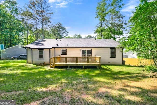 4043 Chedworth Way, Stone Mountain, GA 30083 - back of property featuring crawl space, a deck, and roof with shingles