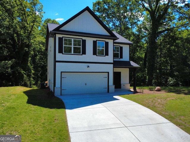 3110 Granada Way, Gainesville, GA 30506 - view of front facade featuring driveway, a garage, and a front yard