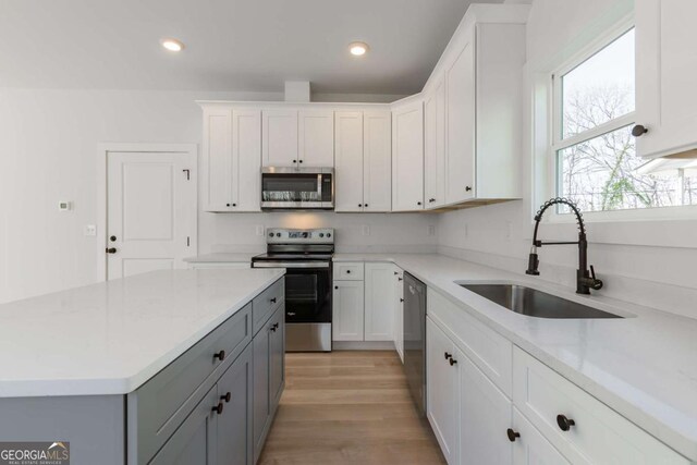 3110 Granada Way, Gainesville, GA 30506 - kitchen with appliances with stainless steel finishes, gray cabinetry, white cabinetry, and recessed lighting