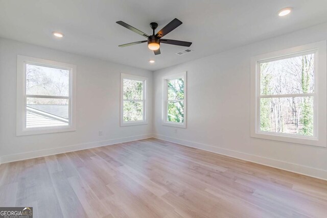 3110 Granada Way, Gainesville, GA 30506 - unfurnished room featuring healthy amount of natural light, a ceiling fan, recessed lighting, and light wood finished floors
