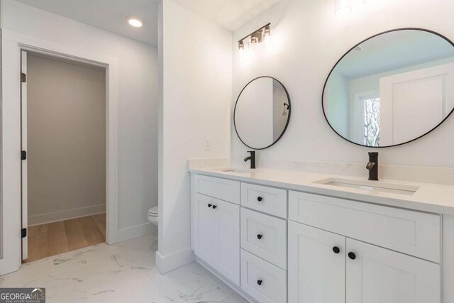 3110 Granada Way, Gainesville, GA 30506 - bathroom with double vanity, marble finish flooring, and recessed lighting