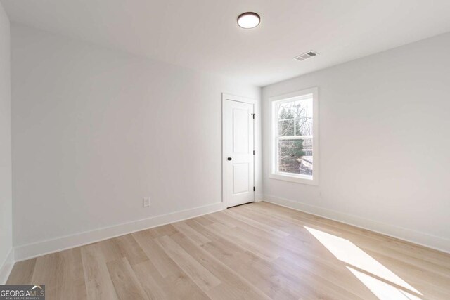 3110 Granada Way, Gainesville, GA 30506 - spare room featuring light wood finished floors