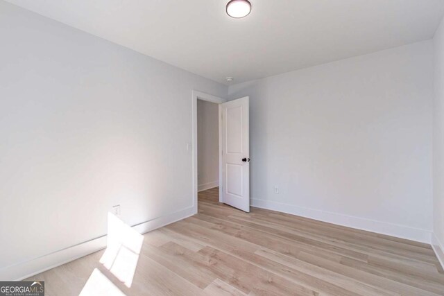 3110 Granada Way, Gainesville, GA 30506 - empty room with light wood-style flooring and baseboards