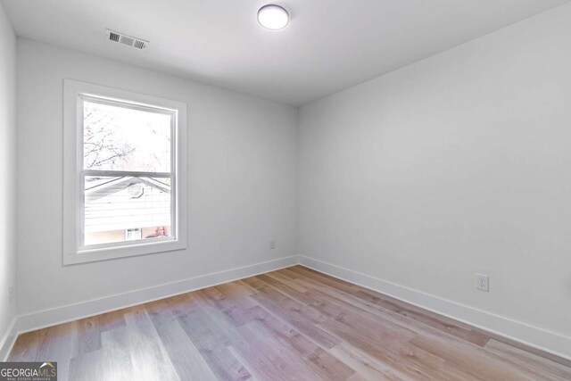 3110 Granada Way, Gainesville, GA 30506 - empty room featuring baseboards and light wood-style floors