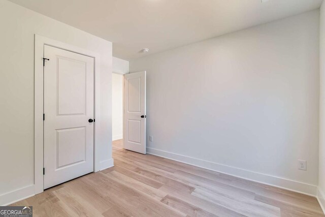 3110 Granada Way, Gainesville, GA 30506 - unfurnished bedroom featuring light wood finished floors